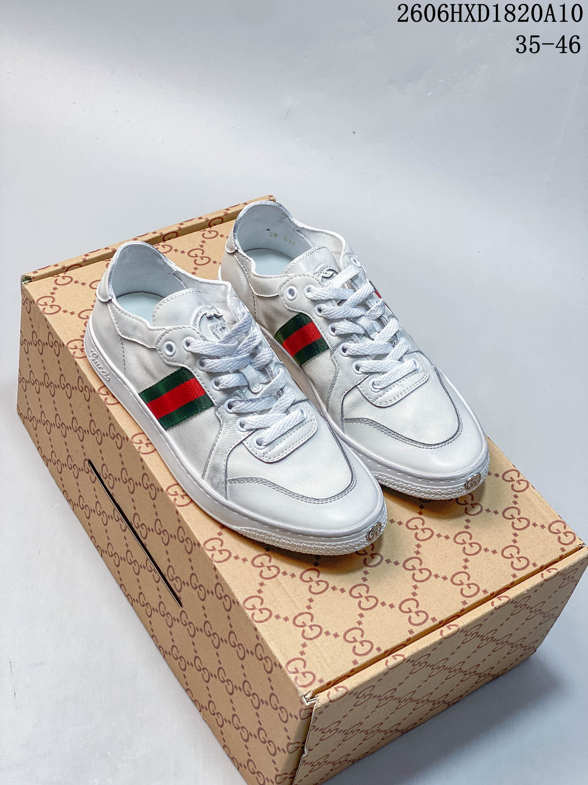 Gucci White Low-Top Sneakers with Green-Red Web Stripe