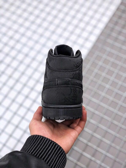 Rear view of the black high-top sneaker showing the padded collar and heel panels.