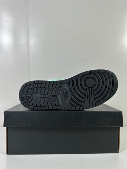 Outsole view showing the black patterned rubber sole of the sneaker.