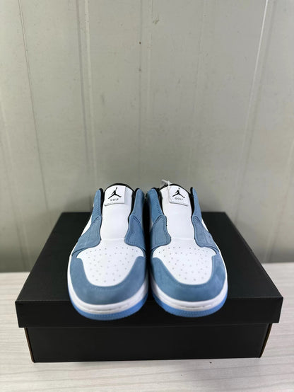 Front view of the pair showing perforated white toe areas, blue overlays, and Jordan Golf tongue branding.