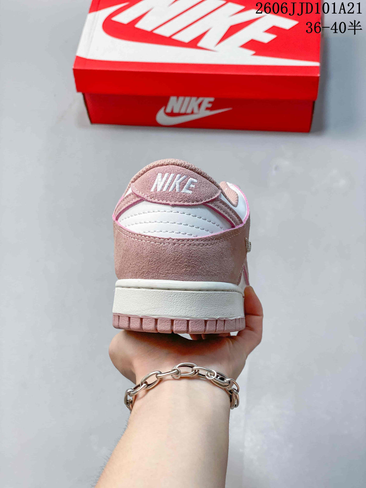 Nike Dunk Low SB Pink and White Low-Top Sneakers