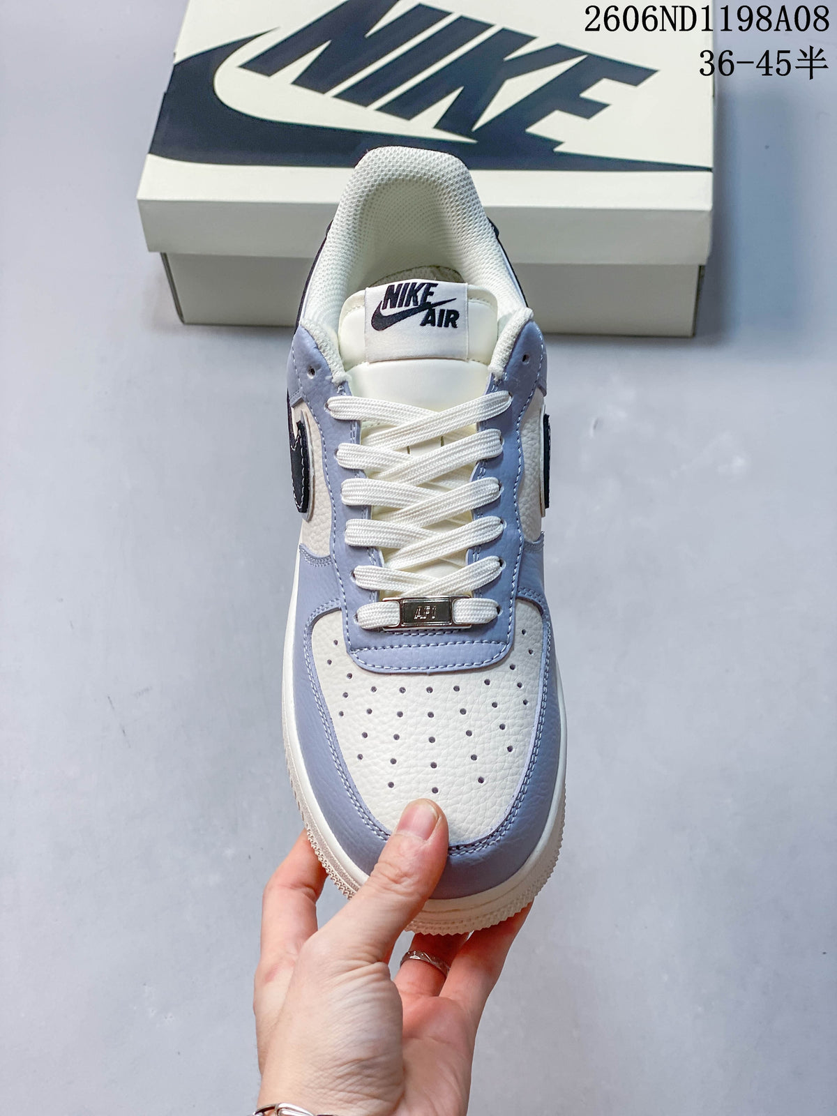 Nike Air Force 1 '07 Low Sneakers in White and Light Blue