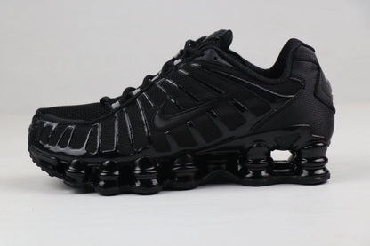 Nike Shox TL Sneakers in Black and Gold