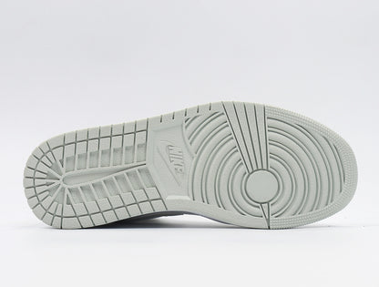 Bottom view showing the rubber outsole with circular and segmented traction patterns.