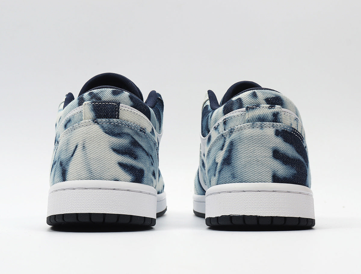 Rear view showing the washed denim-look heel panels, white midsoles and black outsoles.