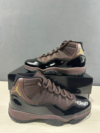 Close angled view of the black patent-style lower upper, bronze textile panels, and high-top collar.