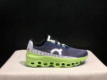 On Cloudmonster Running Shoes in Navy and Lime