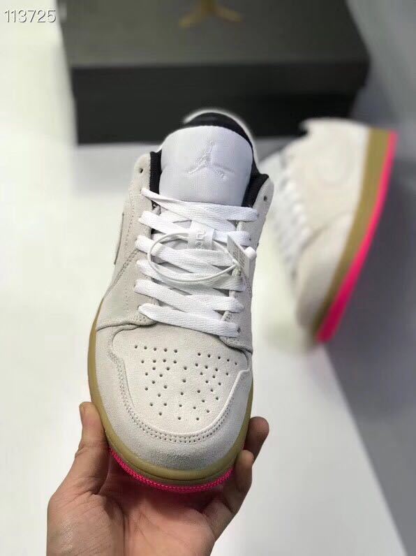 Front view showing the perforated toe box, white laces, and black collar accents.
