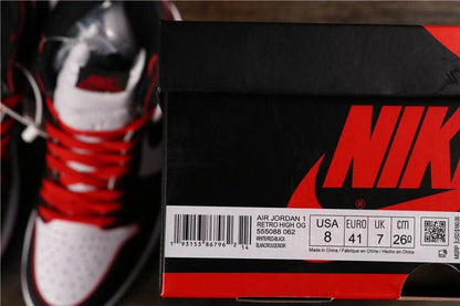 Air Jordan 1 shoe box beside a black, white, and red sneaker; the label shows USA 8, EURO 41, UK 7, and CM 26.0.