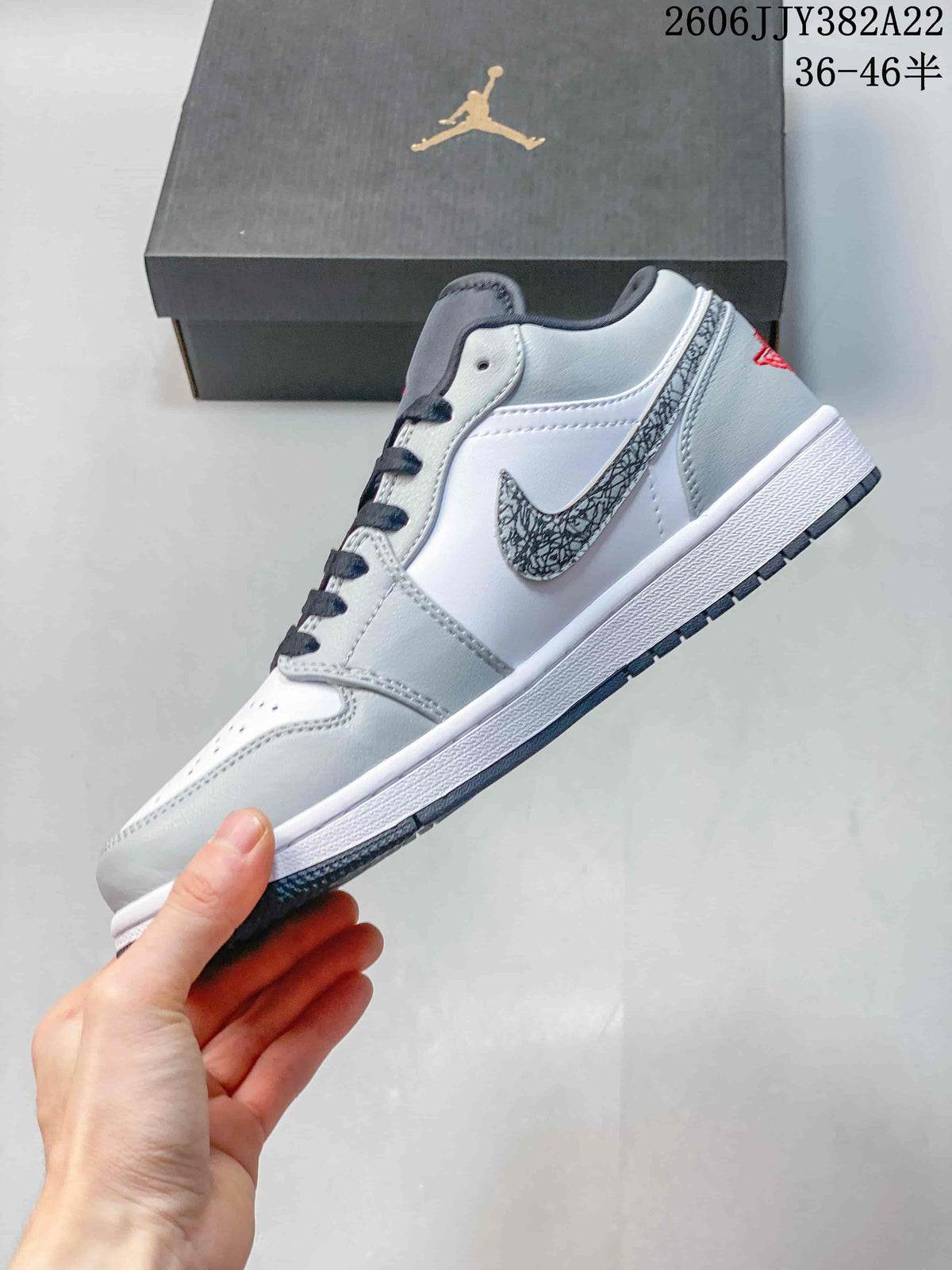 Jordan Air Jordan 1 Low Sneakers in White and Grey