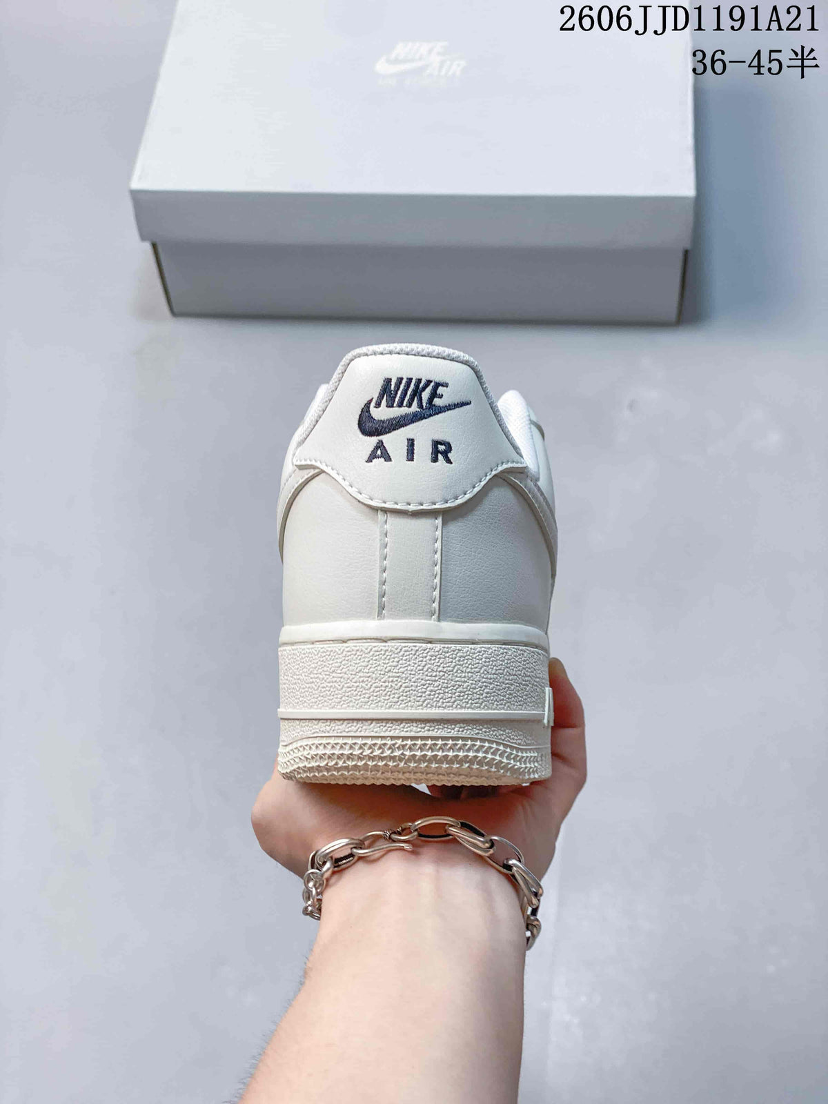 Nike Air Force 1 Low White Sneakers with Black Mini Swoosh