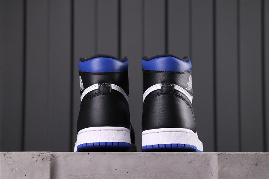 Rear view of black, white and blue high-top sneakers.
