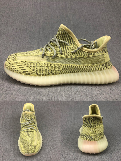 Side, front, and rear views of the olive-yellow and black low-top sneaker.