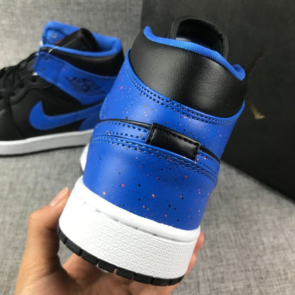 Close-up of the blue heel panel, black collar, stitching, and white midsole.
