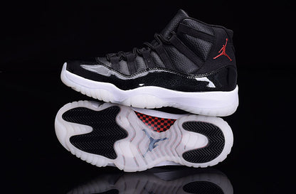 Side view of a black high-top sneaker positioned above its outsole, showing black traction areas and translucent white sections.