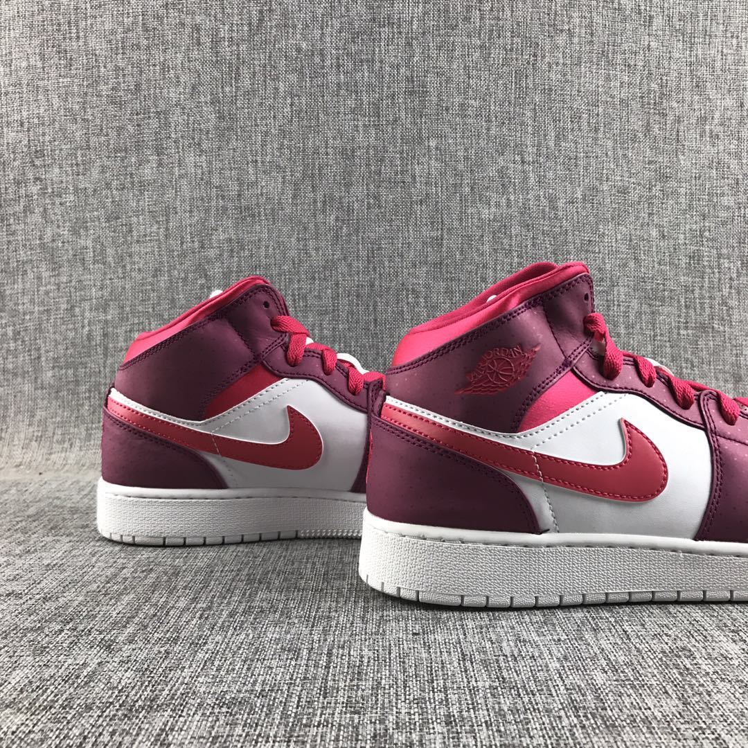 Close three-quarter view of both sneakers from the side.