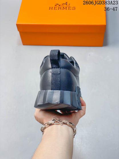 Hermès Low-Top Lace-Up Sneakers in Navy