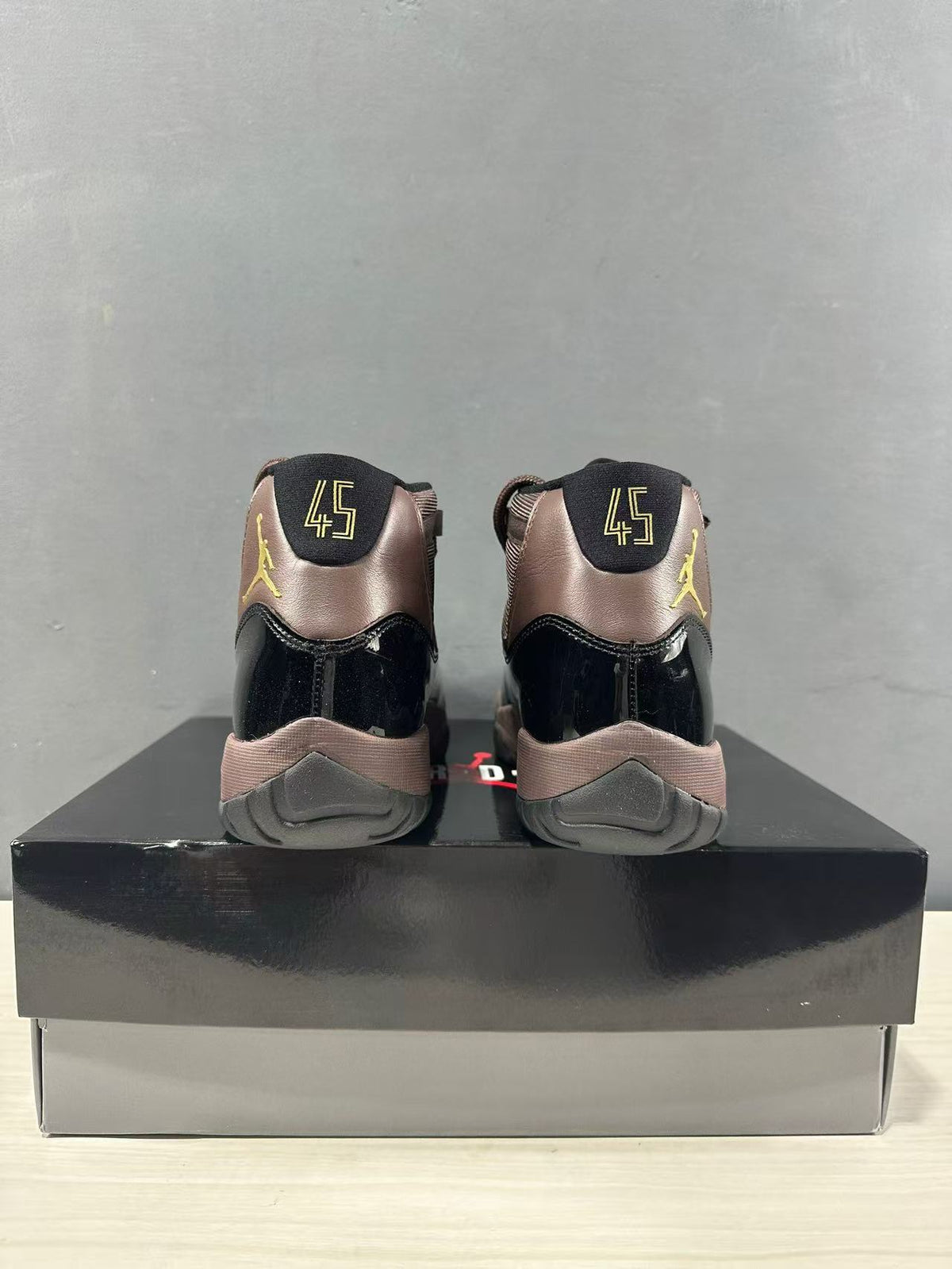 Rear view of the pair with a visible heel size marking of 45.