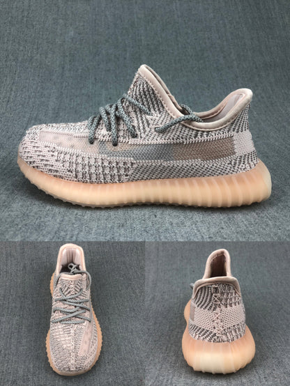 Side, top, and heel views of the gray knit-style sneaker with a translucent side stripe and ribbed sole.