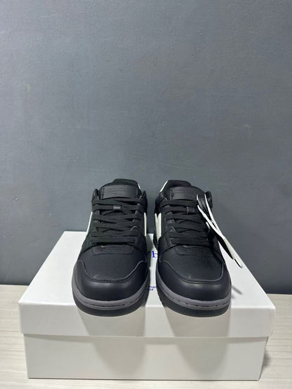Front view of the pair showing black laces, perforated toe panels, and rounded toes.