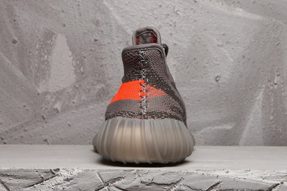 Yeezy 350 V2 Sneakers in Charcoal and Bright Orange