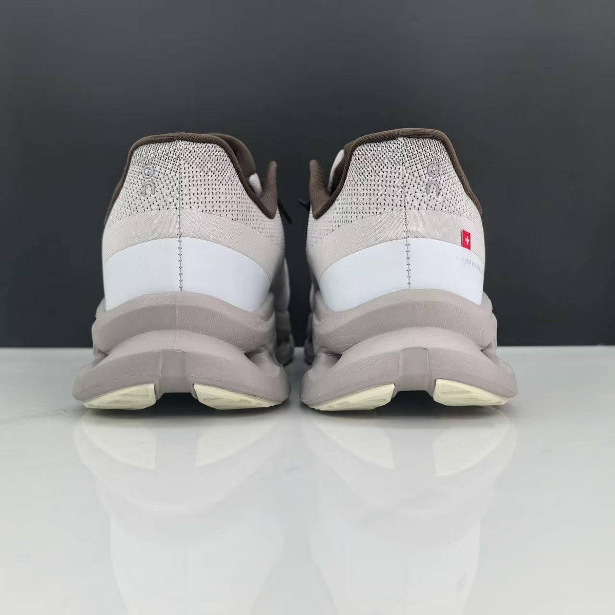 On Cloudmonster Running Shoes in Light Gray and Taupe