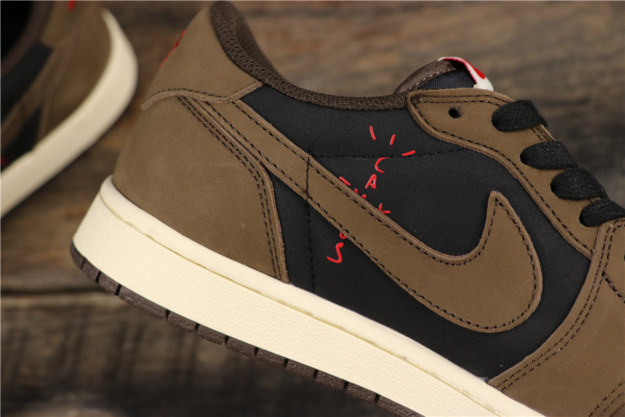 Close-up of the side panel with a brown Swoosh over a black upper and red graphic accents.