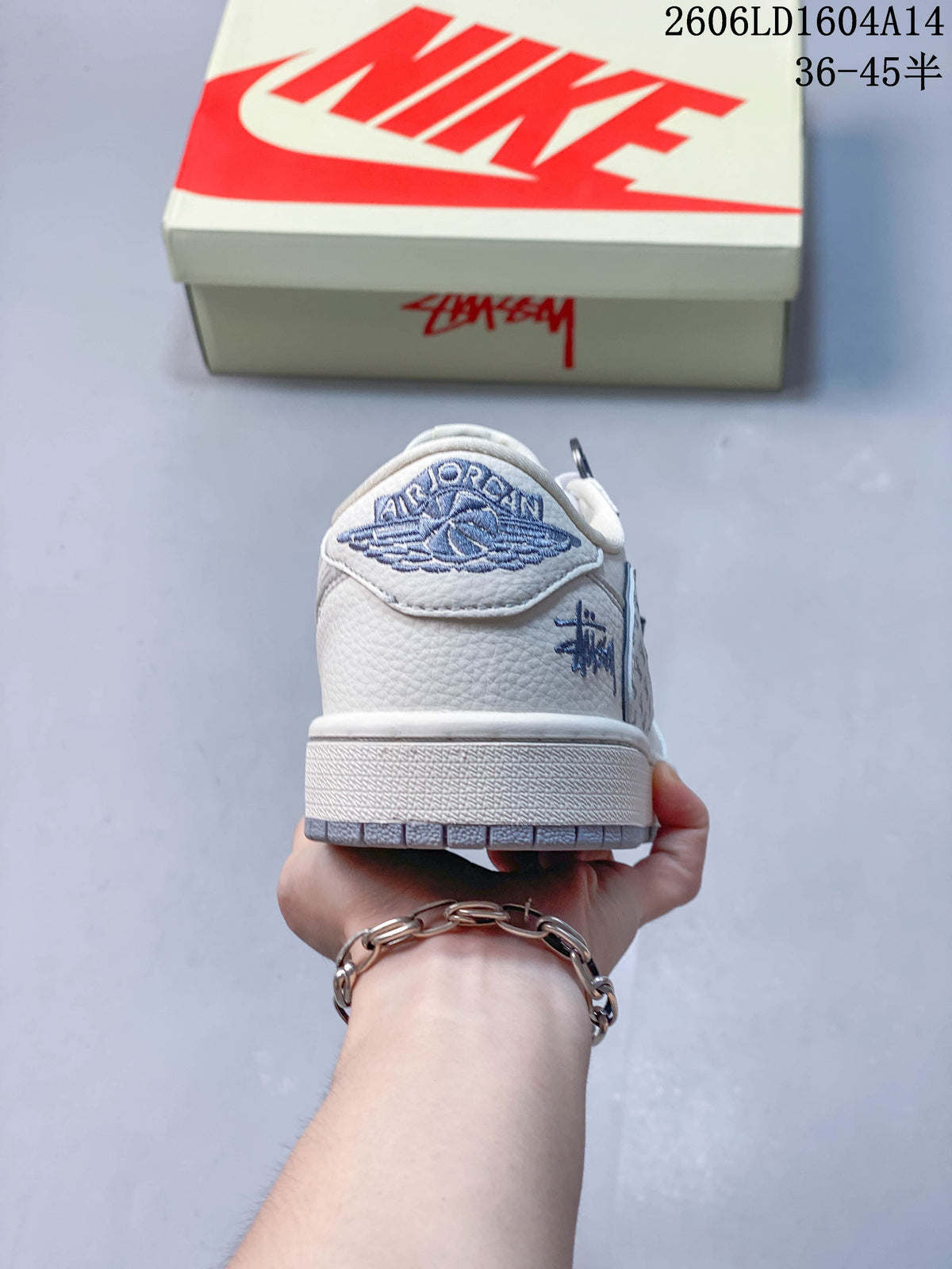 Travis Scott x Jordan 1 Low Sneakers in Ivory and Gray