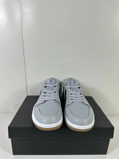 Front view showing the perforated toe boxes, grey laces, and gum-colored outsole edges.
