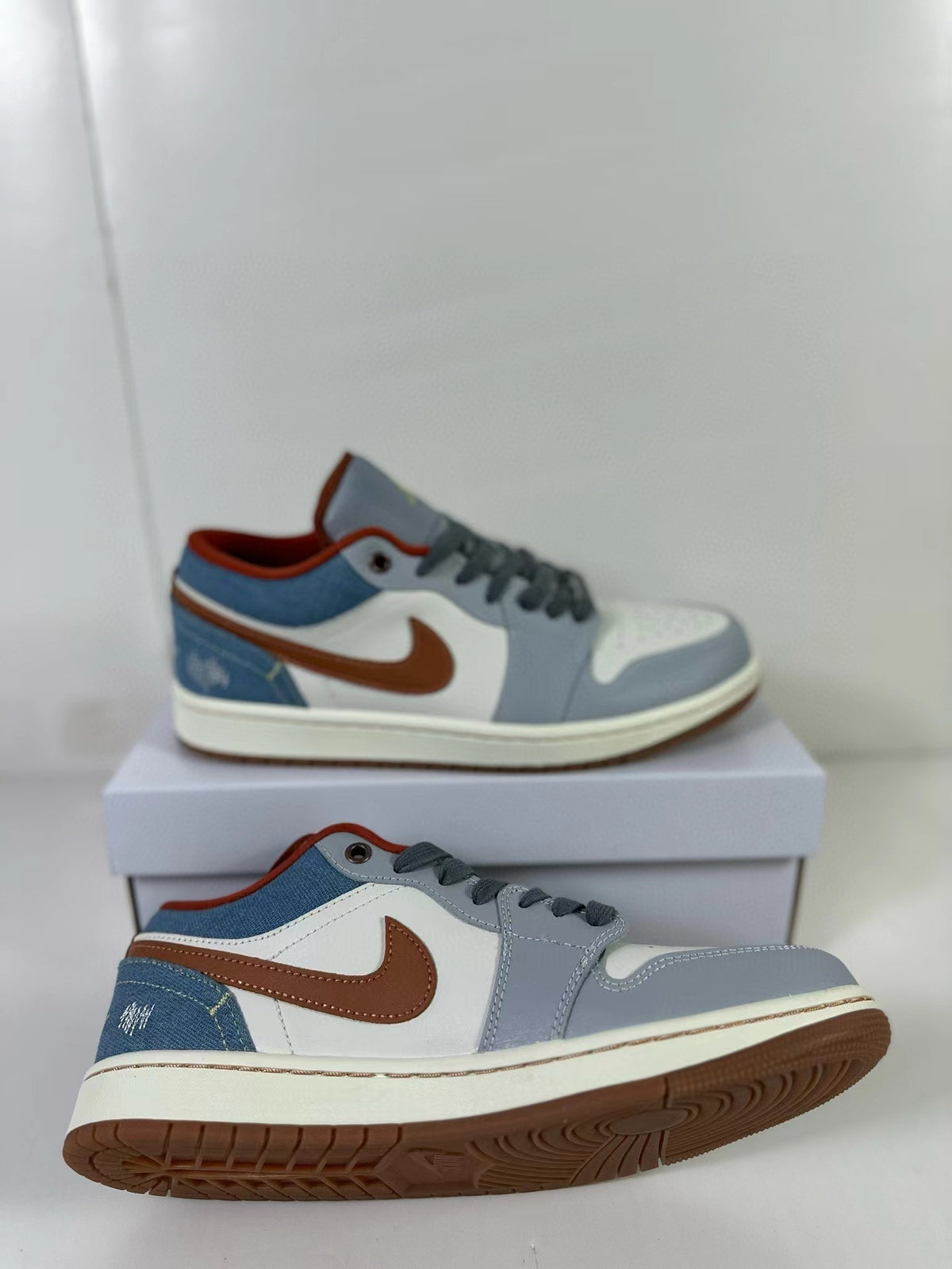 Angled view of the sneakers showing the side panels and outsole