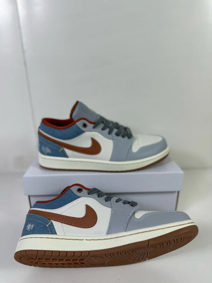 Angled view of the sneakers showing the side panels and outsole