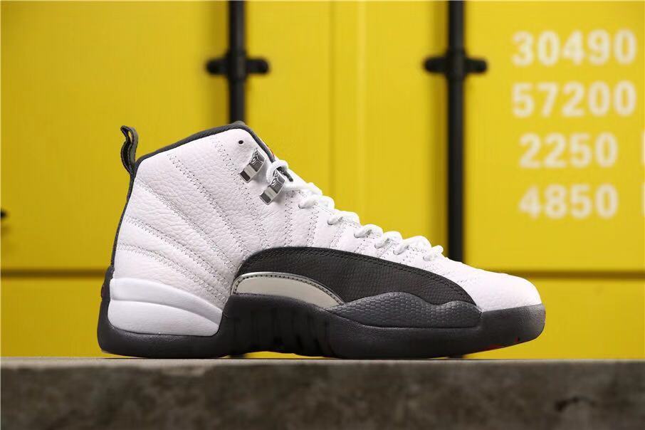 Side profile showing the white upper, dark grey forefoot overlay and high-top construction.