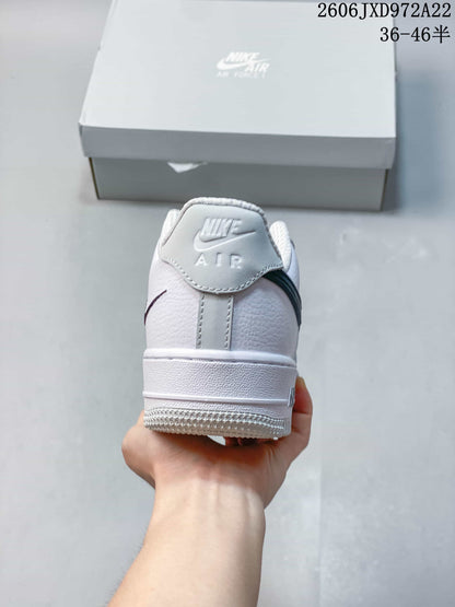 Nike Air Force 1 ’07 Low White Sneakers with Dark Swoosh