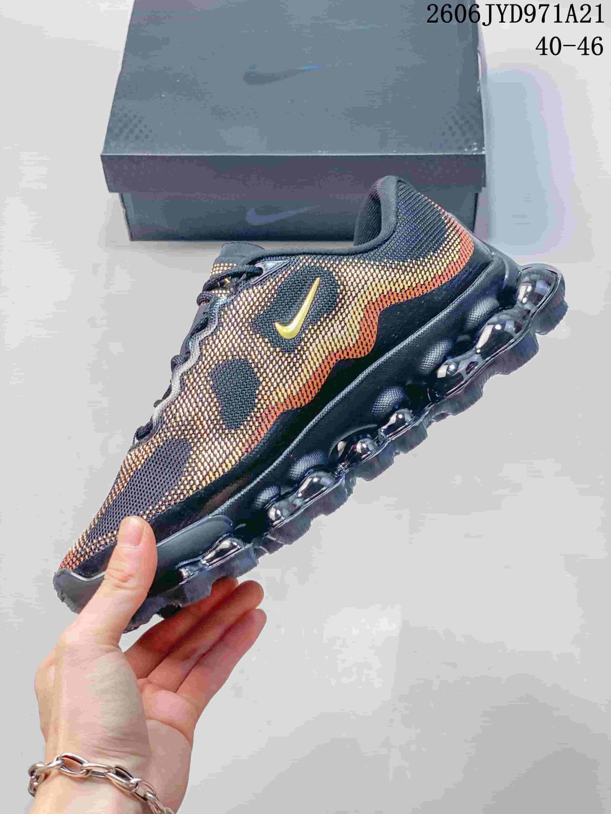 Nike Air Liquid Max Running Shoes in Black and Gold
