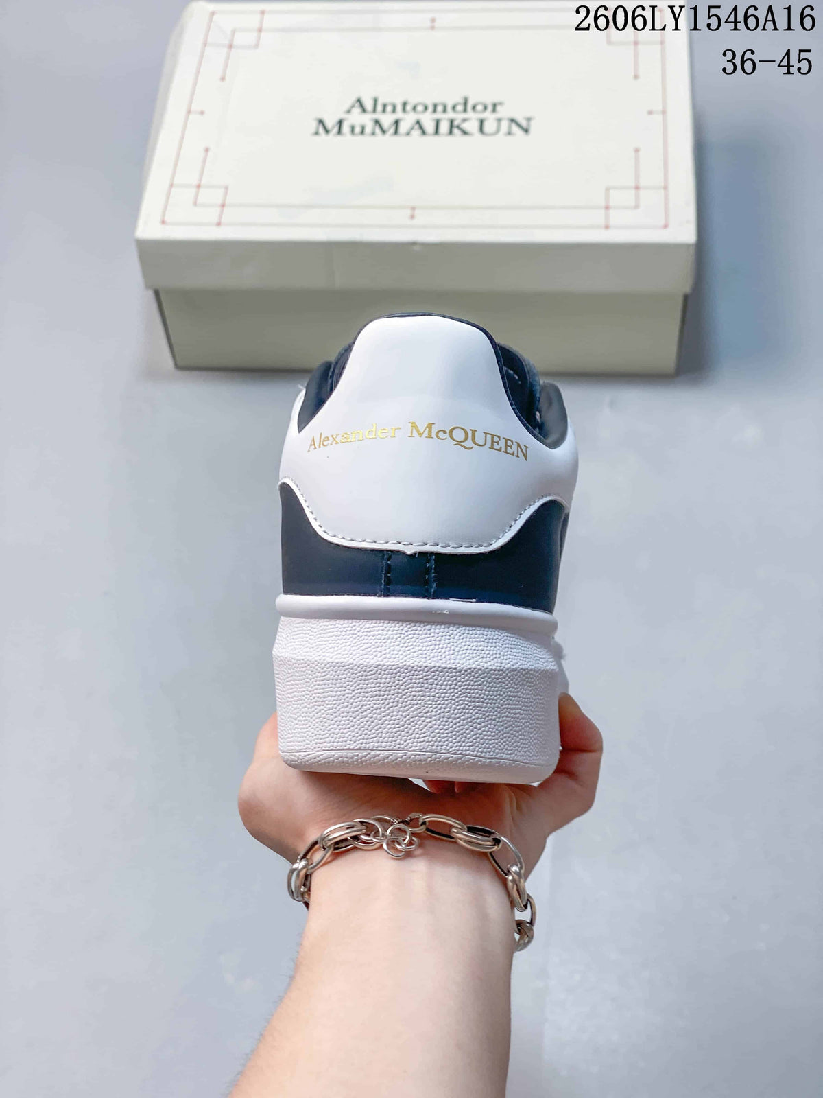 Alexander McQueen Low-Top Sneakers in Navy and White