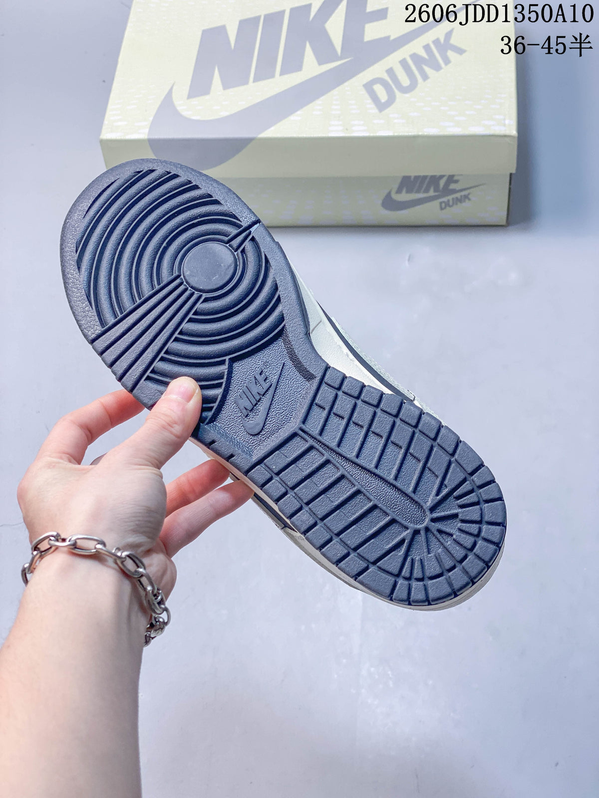 Nike SB Dunk Low Sneakers in Navy and Off-White