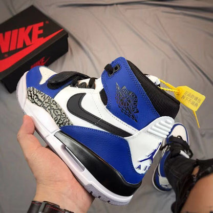 Close rear-side view showing the blue collar, white heel panel, black detailing, and Air Jordan-style heel graphic.