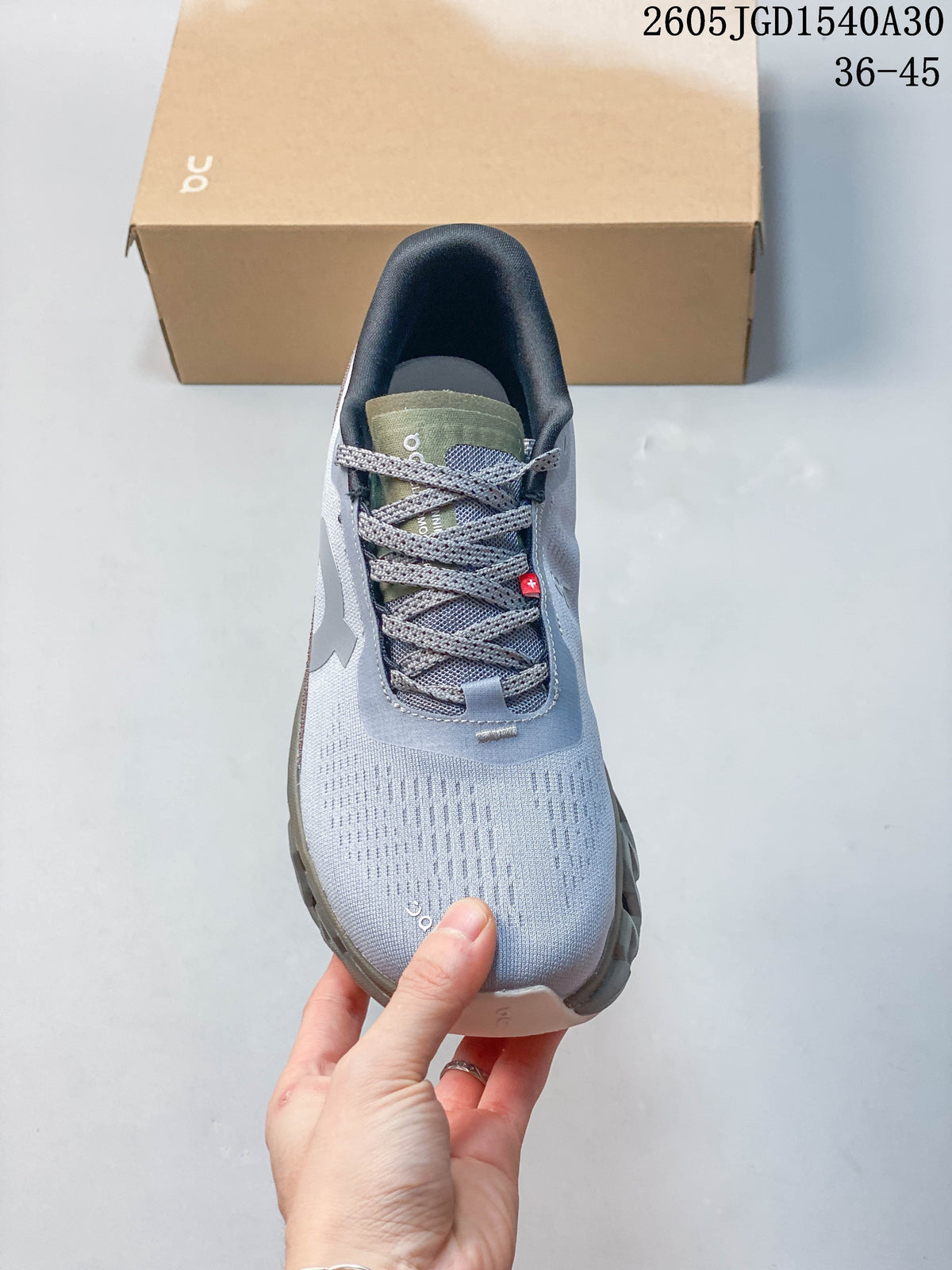 On Cloudmonster Void Low-Top Sneakers in Gray