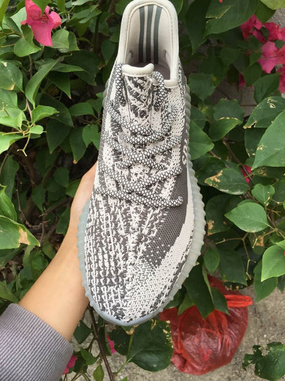 Front top view showing the patterned toe box, laces, and padded collar.