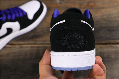 Rear view of the black heel with embossed Jordan Wings branding and a white midsole