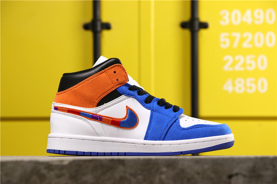 Side profile showing the blue toe and eyestay, white mid-panel, orange collar and multicolor Swoosh detail.