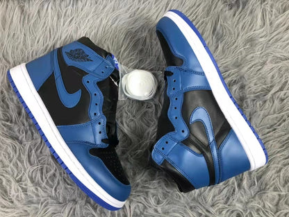 Pair of black and blue high-top sneakers positioned sole-to-sole, showing the side panels, blue outsoles, and white midsoles.