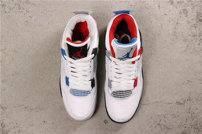 Top view of the paired sneakers showing white uppers, contrasting collars, and multicolor tongue details.