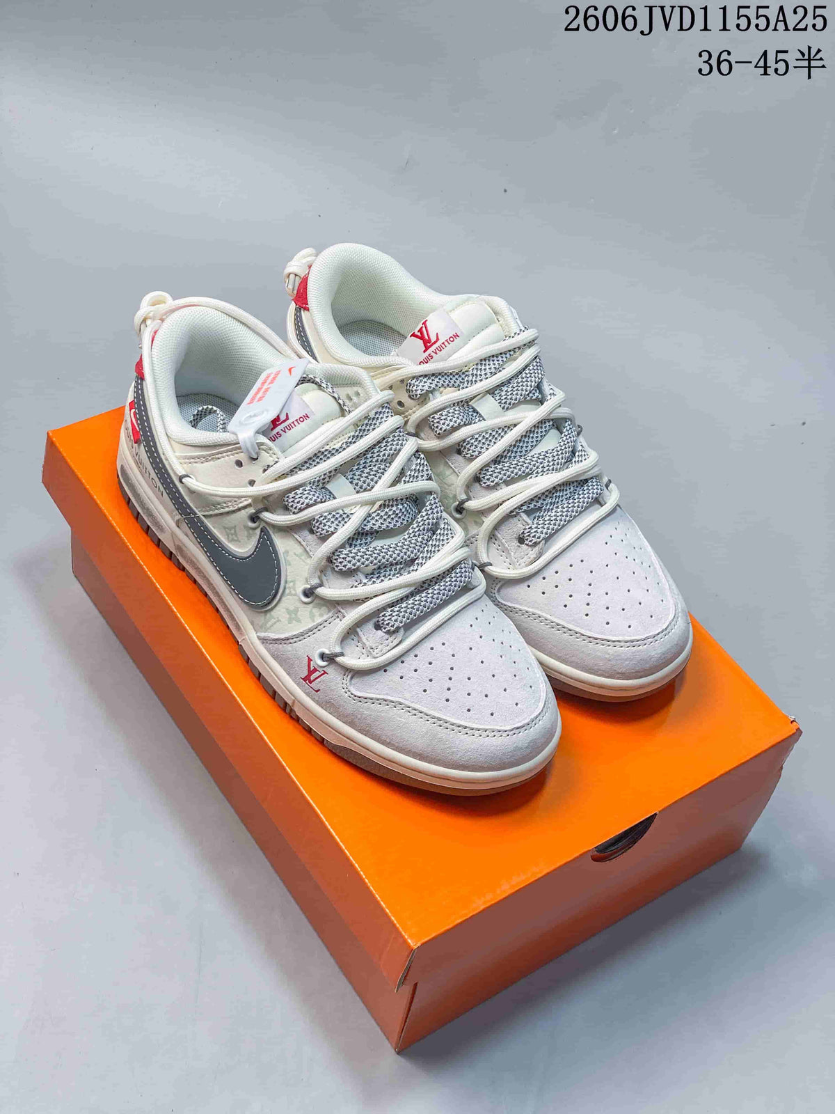 Nike SB Dunk Low Pro Sneakers in Gray and White