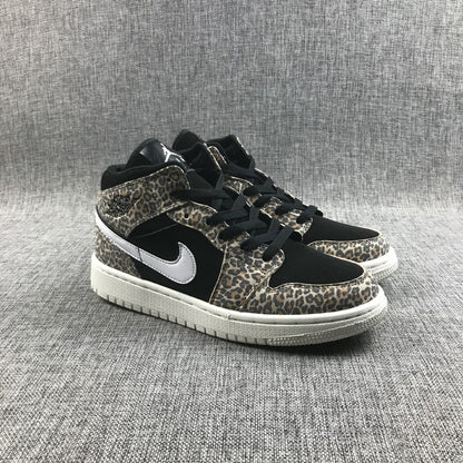 Three-quarter front view of the pair with leopard-print overlays, black toe boxes, white Swooshes, and white outsoles.