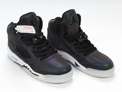 Pair of dark iridescent Jordan 5 Retro sneakers with black laces.