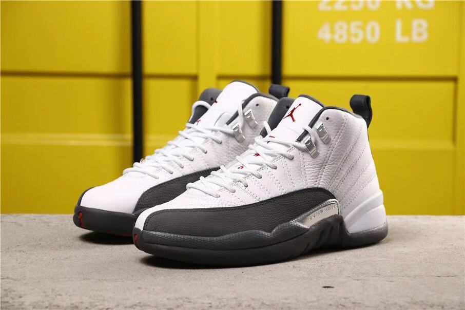 Pair of sneakers shown from the front three-quarter angle against a yellow background.