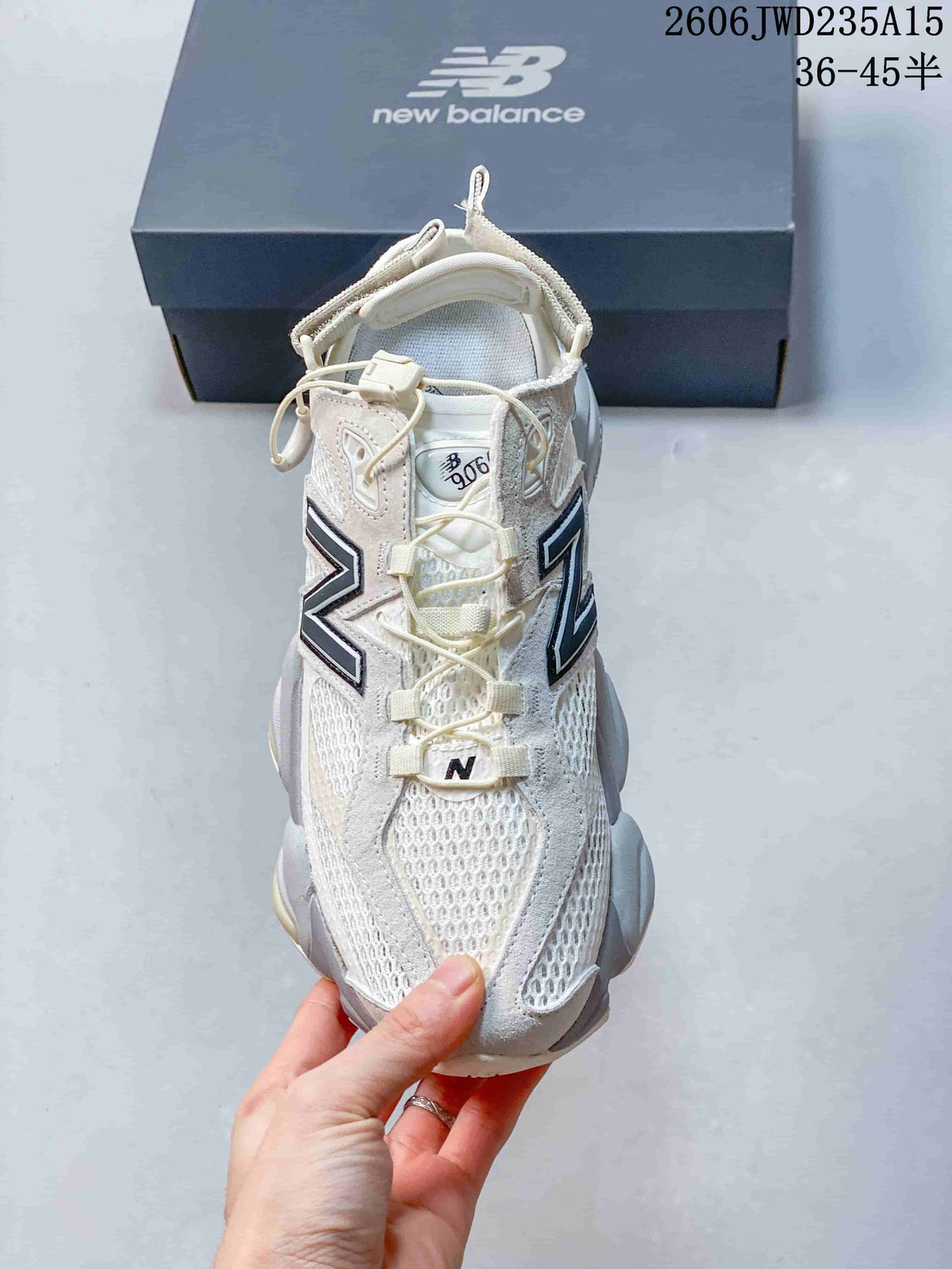 New Balance 9060 Sneakers in White and Gray