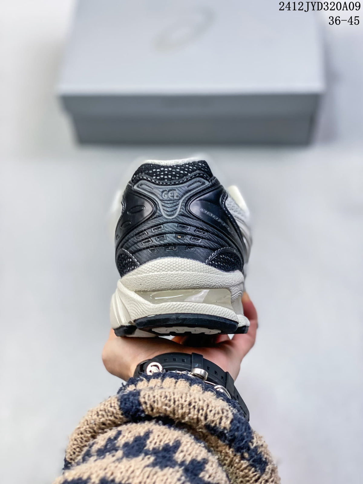 ASICS GEL-KAYANO 14 White and Black Sneakers