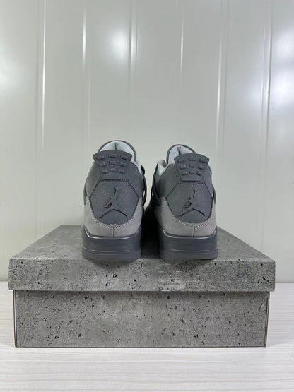 Rear view of the pair showing the tonal Jordan heel logos and layered grey heel panels.